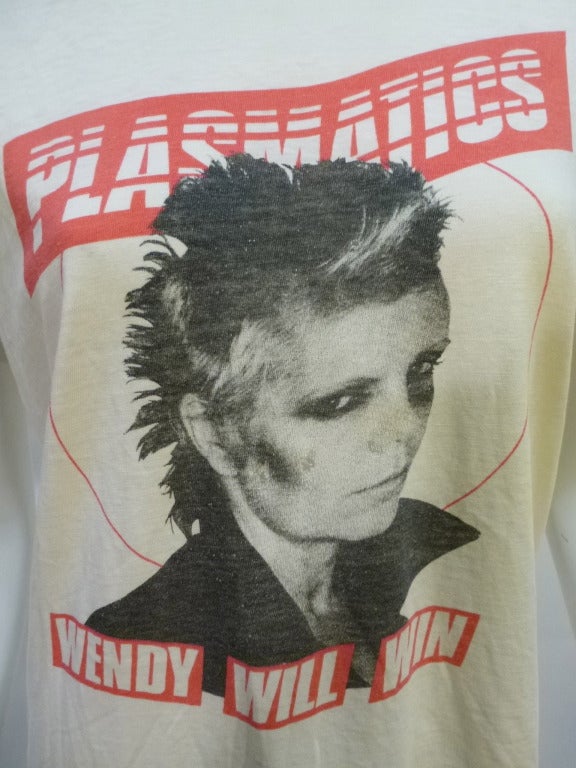 Excellent T-shirt for Wendy O. Williams' Plasmatics, commemorating her arrest in Milwaukee and subsequent obscenity trial (she was cleared).

Stated Size L. Bust: 17.5