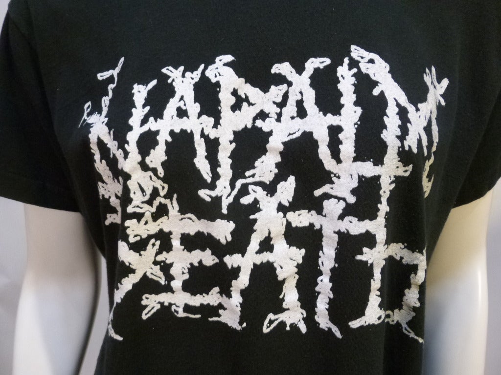 This is a vintage 1987 shirt for the debut LP, Scum, of Britain's influential grindcore band Napalm Death.
No stated size nor tags. Bust: 21