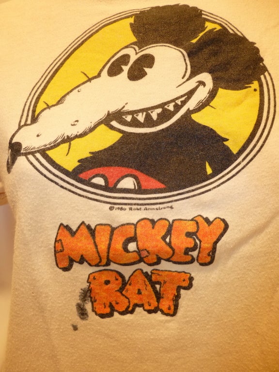 Mickey Rat was a popular underground comic written and drawn by Robert 'Robt' Armstrong in the late 70s/early 80s. Mickey was a beer swilling foul mouthed ingrate who fills the pages of his eponymous panels with his everyday expoloits and