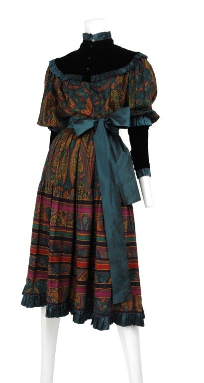 Paisley print soft wool 2pc ensemble with velvet insets and taffeta ruffles. Sash taffeta tie at waist.