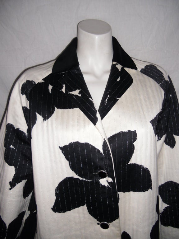 white jacket with black flowers