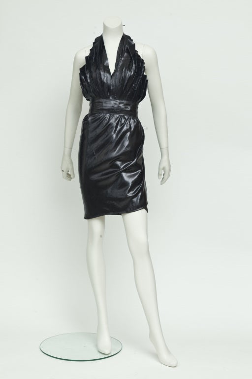 Black lame pleated bodice with halter neckline, naked back. Edgy High Fashion
Collectable piece and very wearable