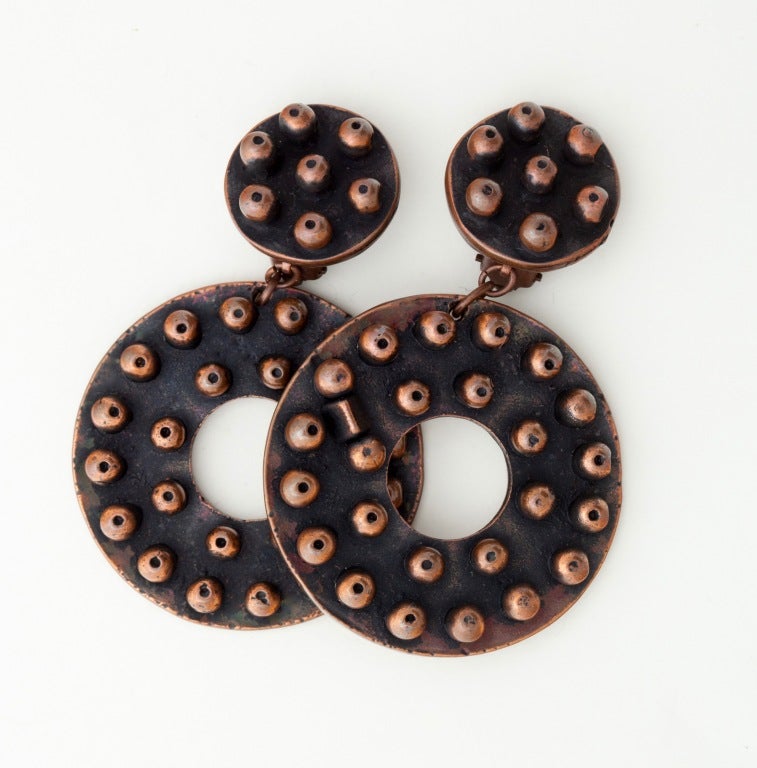 Fabulous pair of 80's Drop Copper Earrings by Scooter.  These unique studded geometric balls drop are super chic for the time period. Great weight and a comfortable fit for a clip. Signed Scooter, Paris.