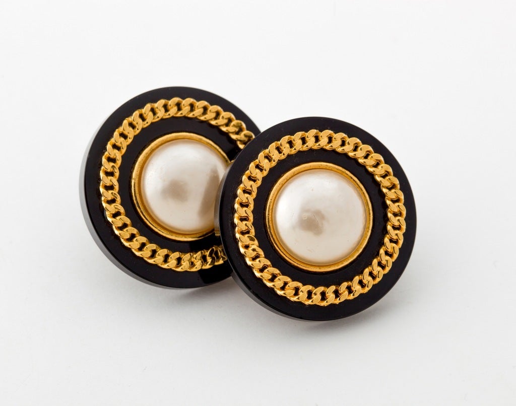 An outstanding and iconic pair of Vintage Chanel Earclips.