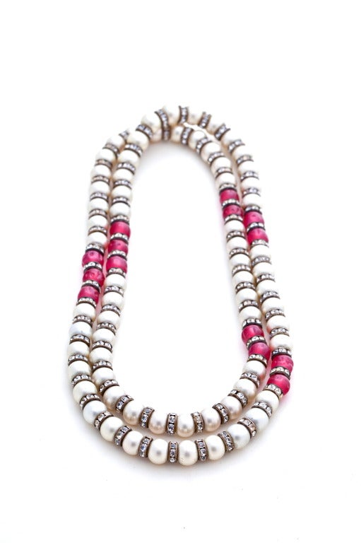 A Fabulous French Art Deco Sautoir composed of faux pearls, rhinestone rondelles, and hot pink art glass beads, with great fire and sparkle that the photographs do not do justice to.