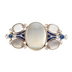 An Exquisite Moonstone & Sapphire Brooch attributed to Louis Comfort Tiffany