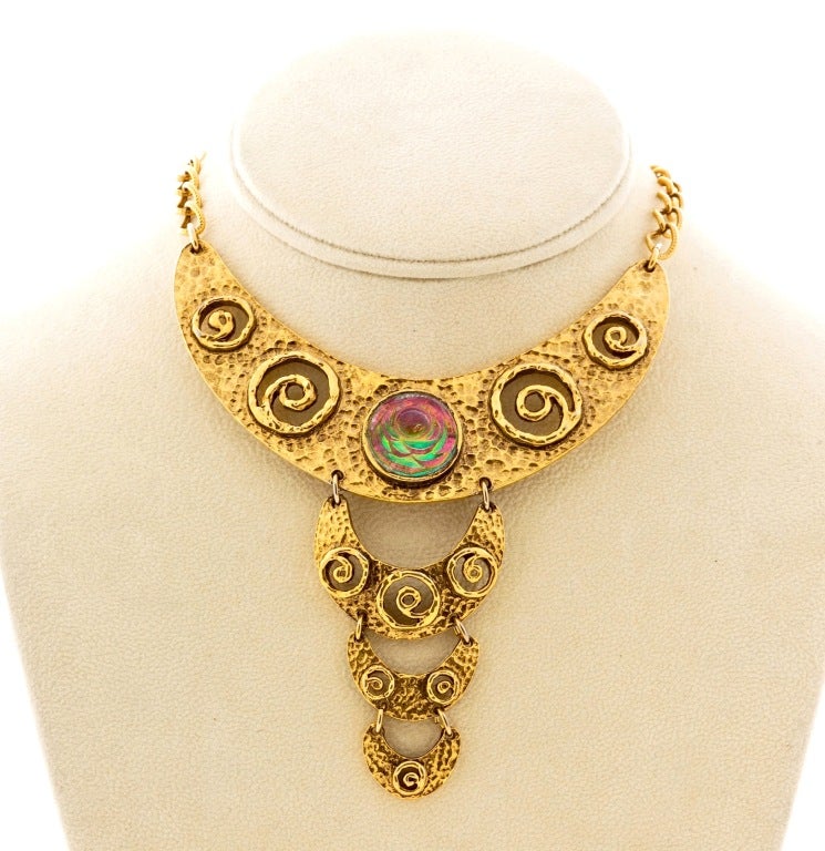 Fabulous Hobe Demi Parure consisting of a beautiful gilt metal choker with art glass medallion and matching clip earrings.  Art Glass changes colors from various angles.  Striking and rare piece.

Pendant is 4.5