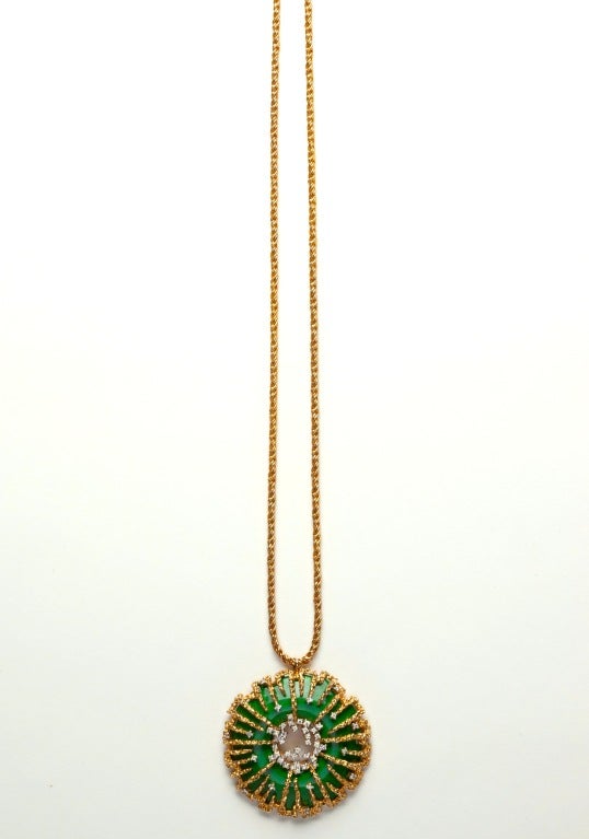 A  Rare Panetta Faux Jade Pendant Brooch in a stunning modernist gilt metal mount with rhinestone accents on a woven gold tone chain.  This outstanding period example is in pristine condition having been part of the designer's personal collection.