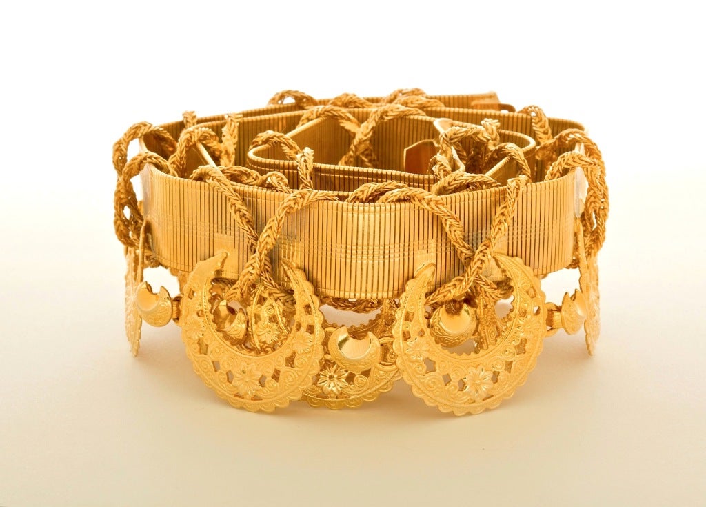 A Dramatic and Stunning Vintage Christian Dior Gilt Metal Belt with elaborate applied rope twists and filigree decorations. Extraordinary Condition!  Signed Christian Dior.