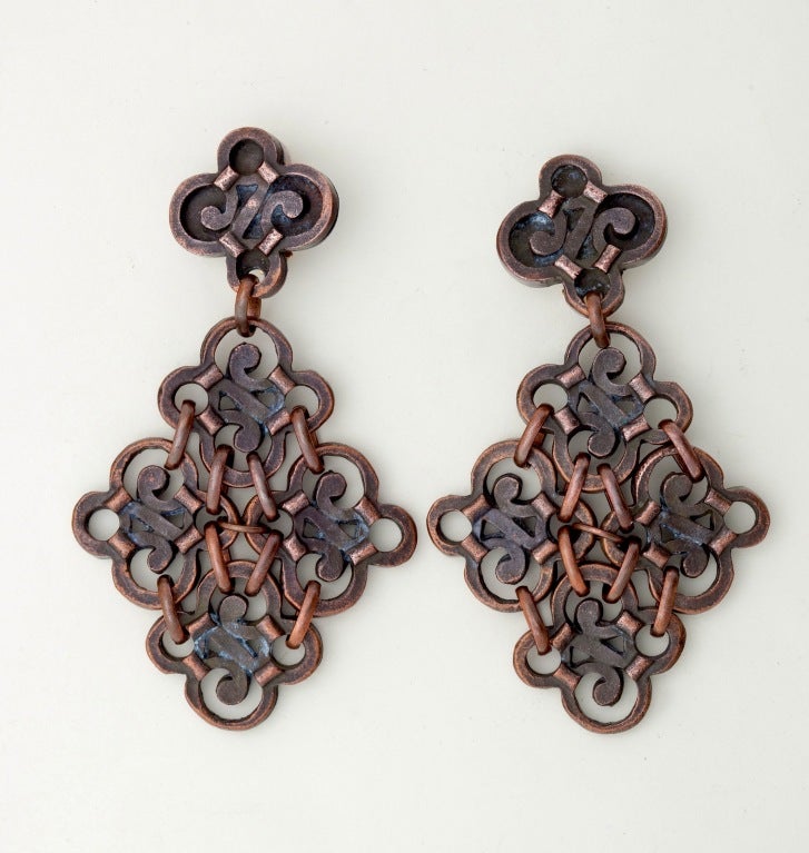 Fabulous Copper Metal earrings from French Designer Claire Deve circa 1980's, part of her ethnic tribal collection.  A French designer who not only has her own studio but designed for Chanel, Lavin, Jean Paul Gaultier and Claude Montana.  Part of a