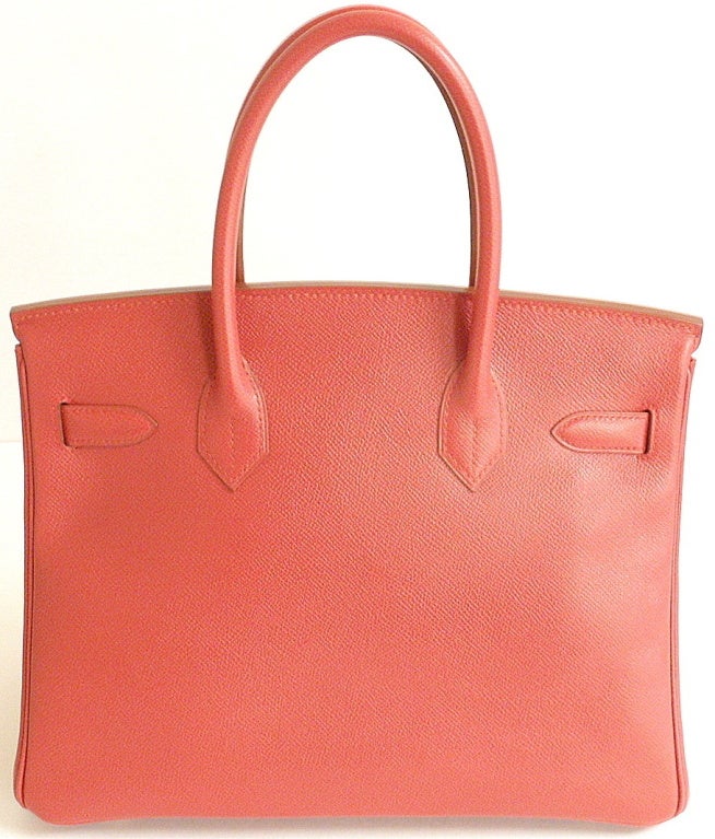 AUTHENTIC! GREAT CONDITION HERMES 30CM RED COURCHEVEL BIRKIN HANDBAG, YEAR 1997

A rare color/leather combination.

*Please note, color may not be fully representative of handbag based on monitor and lighting. This handbag is a true strawberry