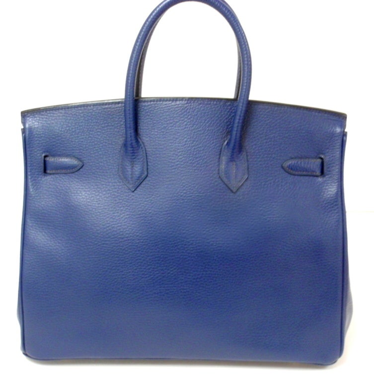 AUTHENTIC! GREAT CONDITION HERMES 35CM BLUE ARDENNES BIRKIN HANDBAG, YEAR 2001

A rare color/leather combination.

*Please note, color may not be fully representative of handbag based on monitor and lighting. This handbag is a true blue. We do