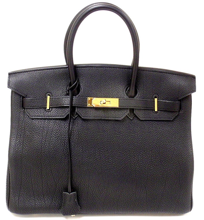 AUTHENTIC! MINTY CONDITION HERMES 35CM BLACK TOGO BIRKIN HANDBAG, YEAR 2003
*Please note, color may not be fully representative of handbag based on monitor and lighting. This handbag is a true black with WONDERFUL veining*
This bag is in great,