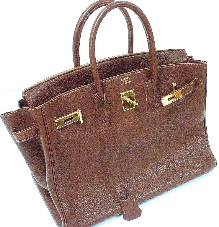 AUTHENTIC GREAT CONDITION HERMES 35CM BROWN CLEMENCE BIRKIN HANDBAG, YEAR 1997

*Please note, color may not be fully representative of handbag based on monitor and lighting. This handbag is reddish brown with light brown stitching and gold