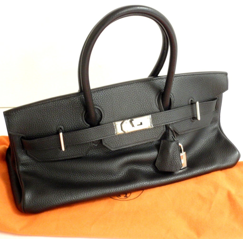 AUTHENTIC! HERMES 42CM BLACK CLEMENCE SHOULDER BIRKIN HANDBAG, YEAR 2005

*Please note, color may not be fully representative of handbag based on monitor and lighting. This handbag is a true black.*

 This bag is in A mint condition.
Features