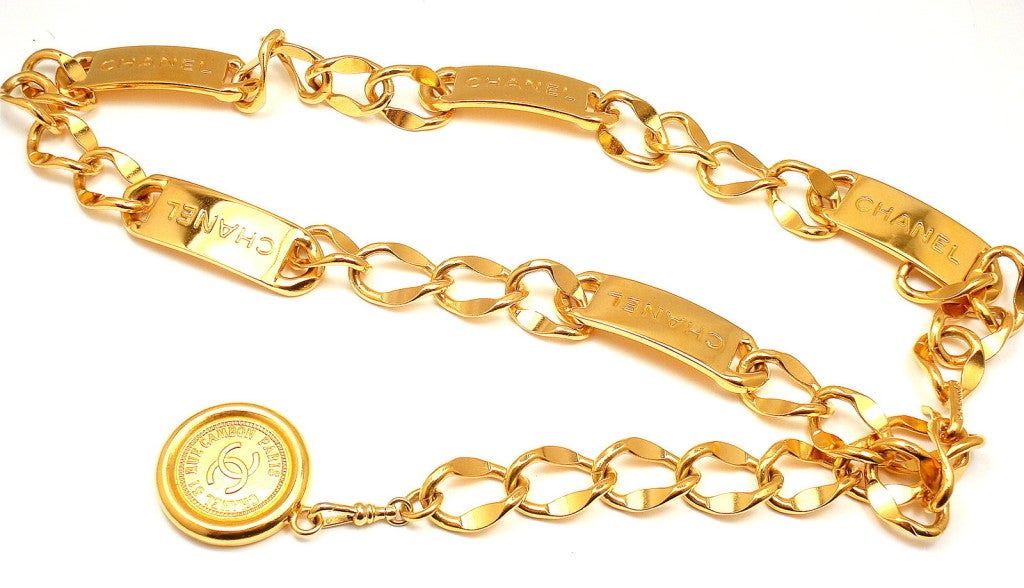 Vintage Gold Tone French Signature Logo Rue Rambon Coin Belt and/or Necklace by Chanel. Measurements: 33mm 