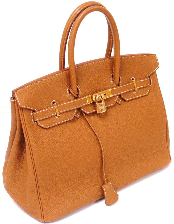 AUTHENTIC! NEAR MINT CONDITION HERMES 35CM CARAMEL TOGO BIRKIN HANDBAG, YEAR 2002

Comes with clouchette with key.

*Please note, color may not be fully representative of handbag based on monitor and lighting. This handbag is warm caramel brown tone