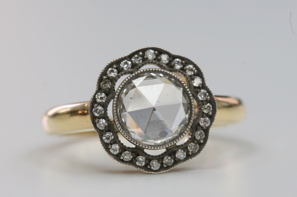0.70 HSI1 rose cut diamond set in a 18K yellow gold and silver hand crafted 