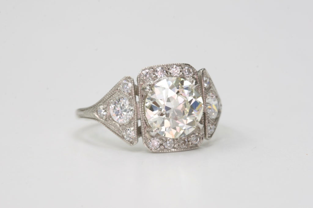 1.86 MN/VS old European cut diamond and set in a vintage platinum mounting. Circa 1920.