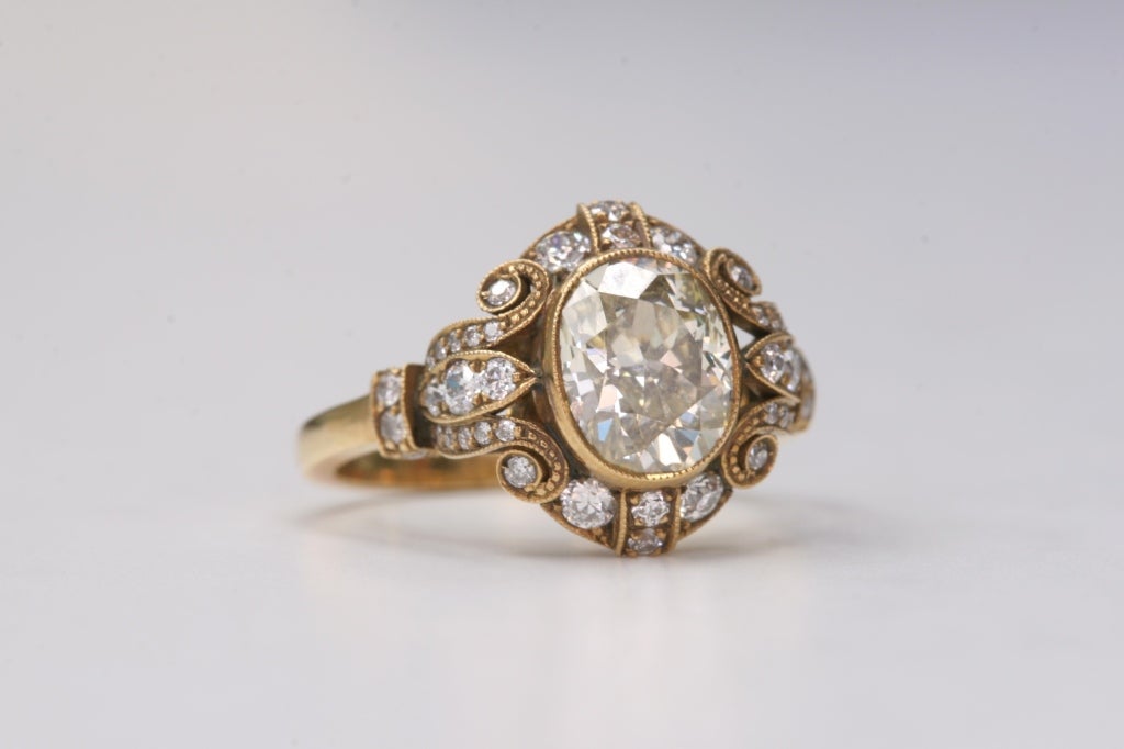 1.61ct Y/VS oval diamond set in an 18kt yellow gold hand crafted 