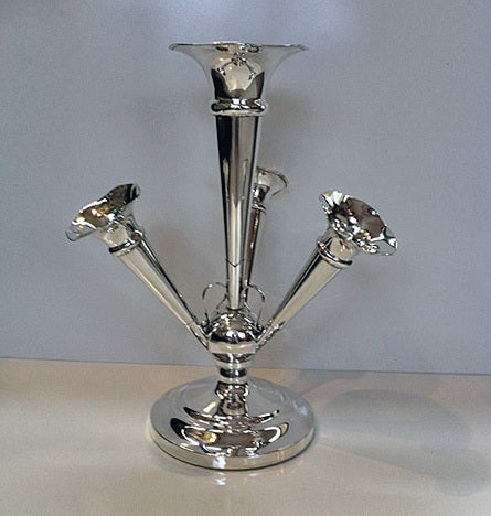 Antique Silver Epergne, Birmingham 1915, Martin Hall & Co. The epergne with four tapered trumpet vases on circular base. Height:- 12 inches. Gross Weight: 24.5 oz.