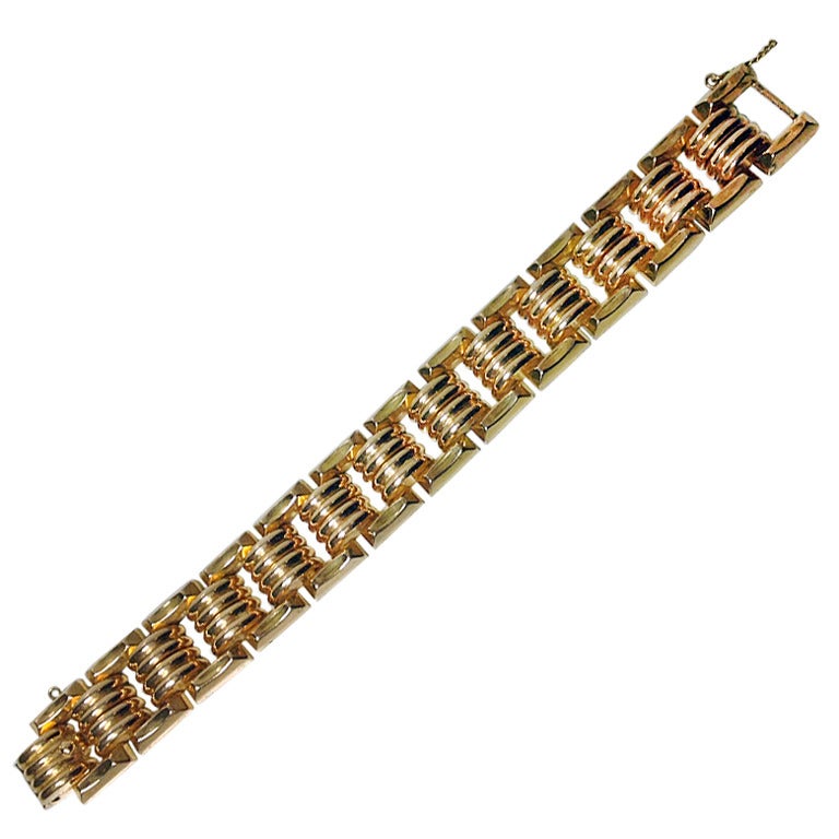18K Bracelet, Continental. C.1950. Length: 7 inches. Item Weight: 60.45 gm. French import Paris Owl mark.