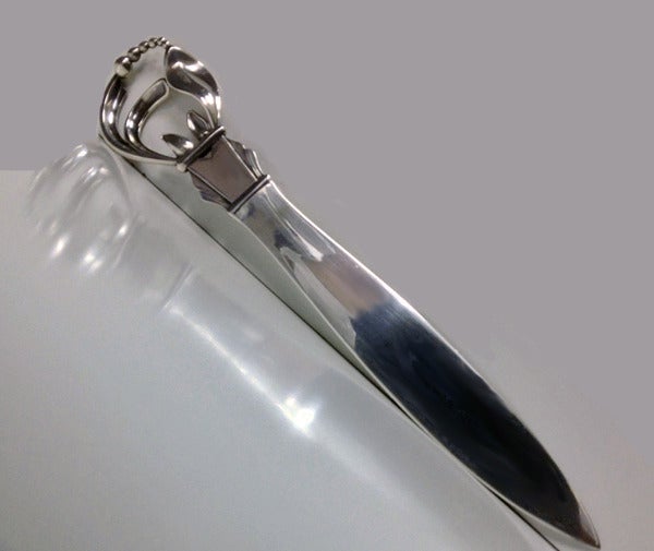 W & S Sorensen Silver Letter Opener, Denmark C.1930. The handle of a blossom stylistic slightly three dimensional form, tapered blade.  Length: 9.75 inches. Weight: 84.12 grams