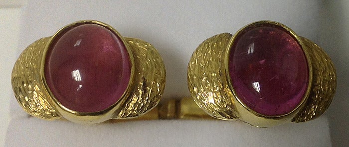 18K and Pink Tourmaline Gentleman's Cufflinks. Oval bezel set pink tourmaline. Item Weight: 15.56gm