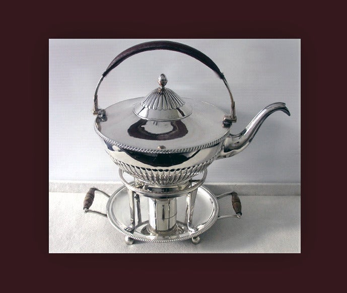 Rare and unusual Old Sheffield Kettle on Stand with lamp, England C.1798 by Watson & Bradbury. The stand on circular gadroon border on four ball feet, turned wood handles set in the centre with original burner.The stand supporting four turned legs