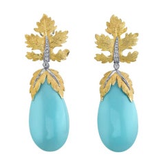 TAMIR Boucles d'oreilles extraordinaires en turquoise et diamants.