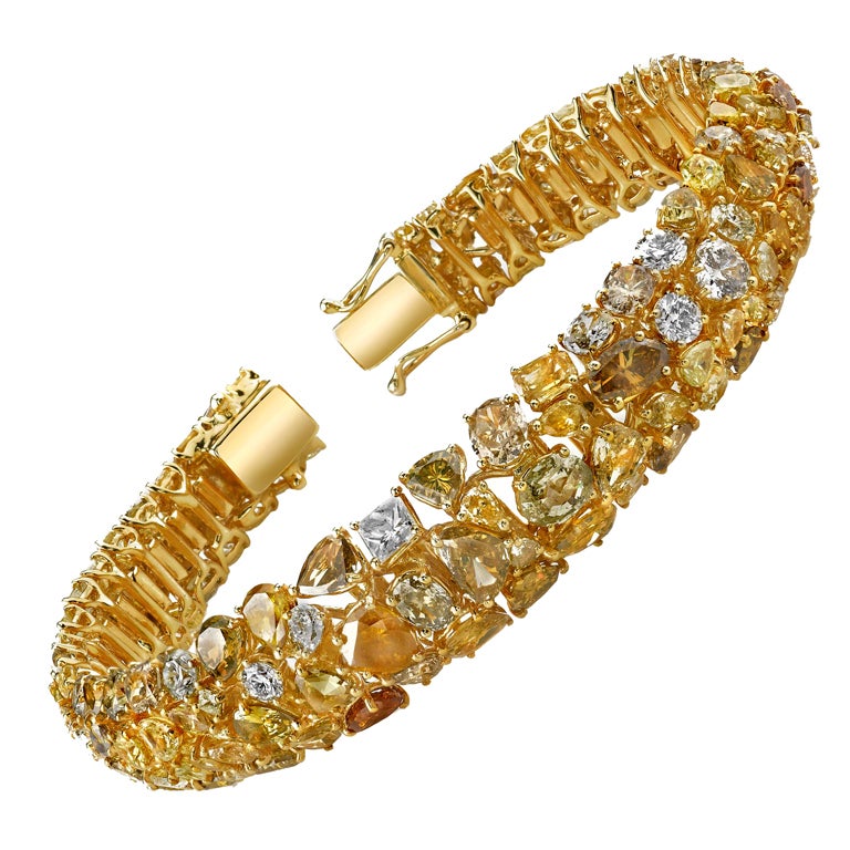 A Unique Natural Fancy Colored Diamond Bracelet.