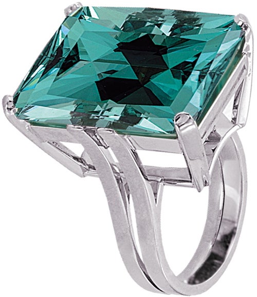 A rare and incredible 35.50ct greenish Blue Tourmaline showcased in a master crafted, double shank, platinum ring. 
Signed by Tamir.