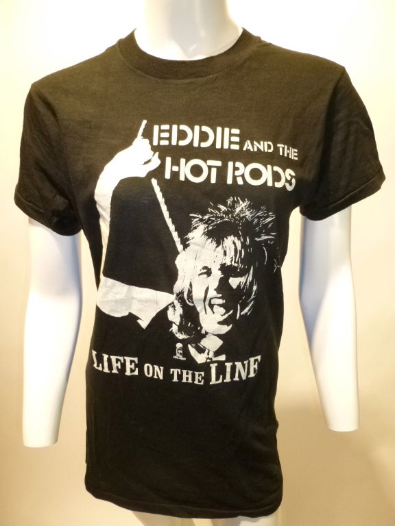Vintage Eddie and the Hot Rods T-shirt from their second studio LP Life On The Line in 1977. No tag, unusually long shirt.