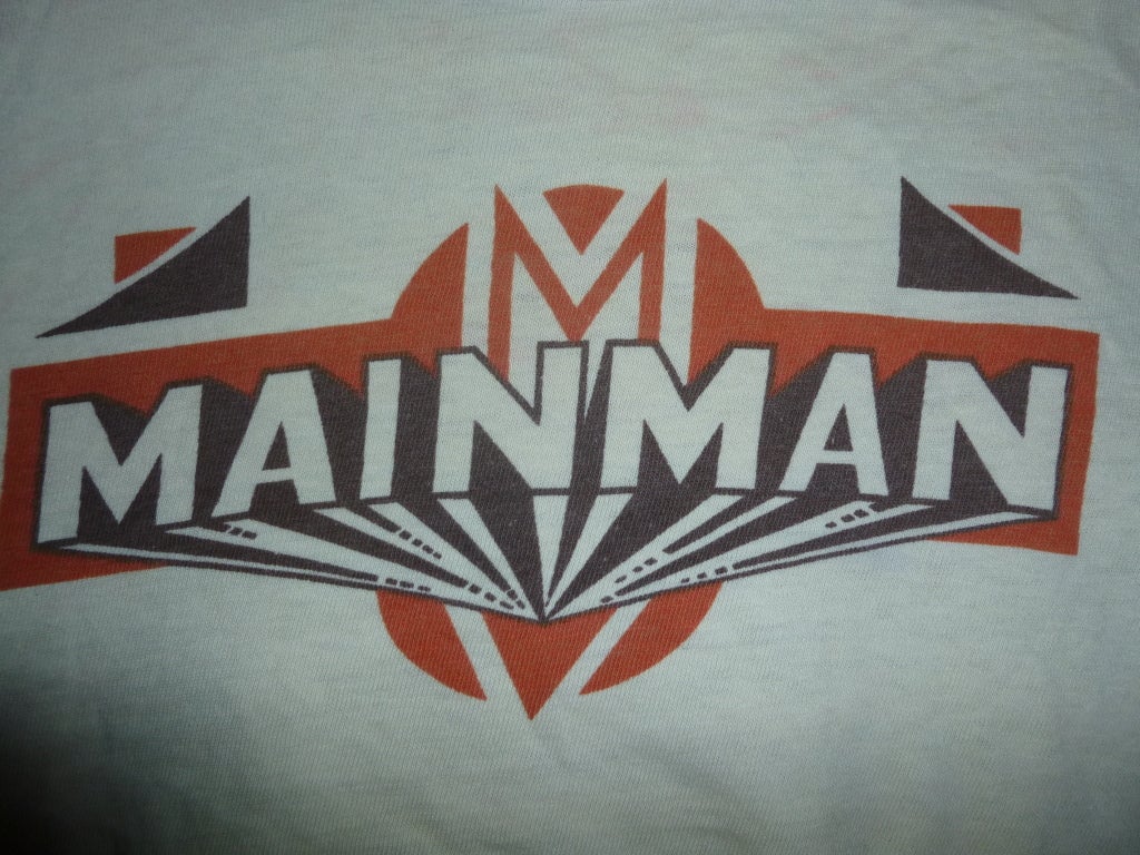 Vintage 1970s T-shirt with the classic logo for Mainman, the late-60's early 70's music management company and one-time management for David Bowie and Mott The Hoople.