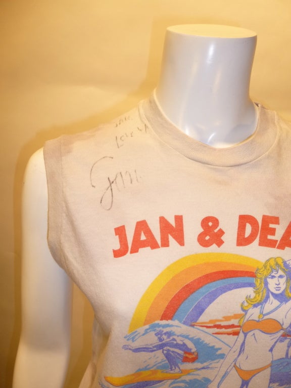 Vintage 80s sleeveless T-shirt for Jan and Dean & The Bel-Air Bandits, a later incarnation of Jan and Dean, primarily live. Signed by Jan and Dean. Some odd staining here and there on the front. See photos.