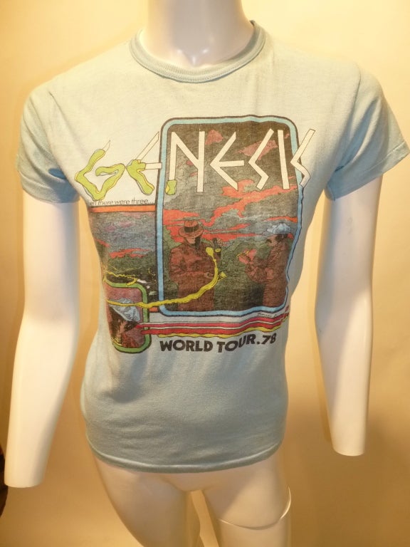 Vintage Genesis World Tour 1978 promotional or commemorative T-shirt in light blue. This tour was for