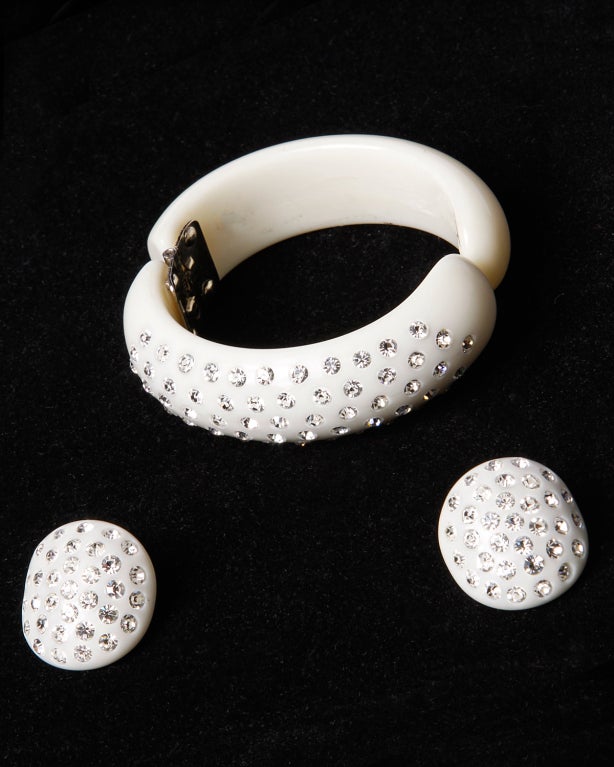 Signed WEISS rhinestone creamy ivory thermoplastic clamper bracelet and earring set. Weiss is famous for their thermoplastic clamper bracelets and they come primarily in cream with clear or colored rhinestones - like this one - or black with clear