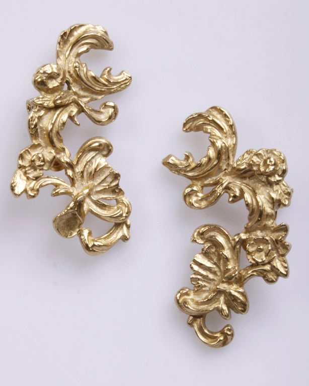 Huge YSL clip back earrings that climb up the sides of your ears! Baroque-inspired faux hammered gold tone metal with organic scrolls and flowers. Signed 