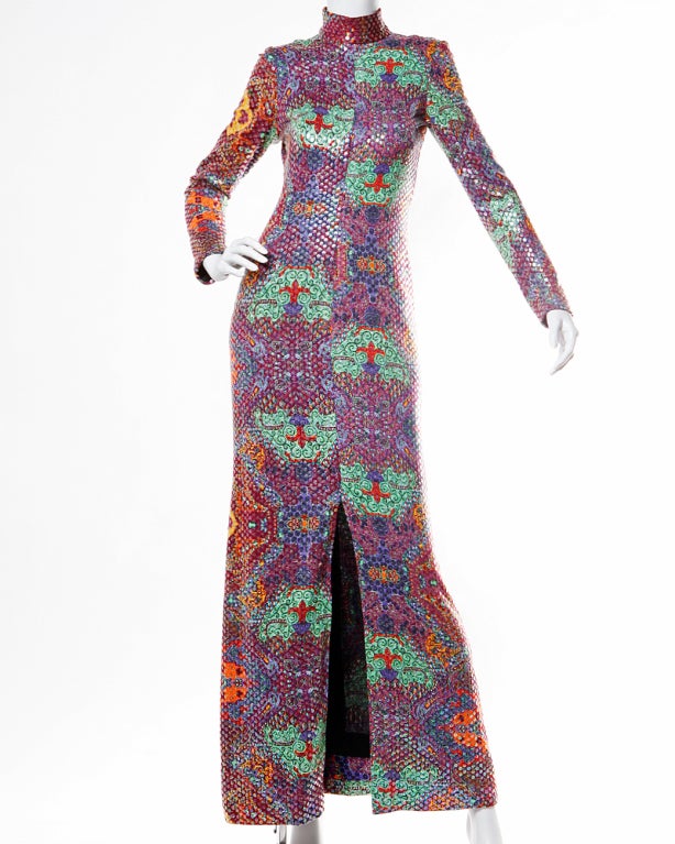 Iconic Elinor Simmons for Malcolm Starr Maxi Dress in printed jersey knit and clear iridescent sequins. Stunning Asian-inspired print, long sleeves, and rear zip closure. Fully lined.

This dress should fit a modern size