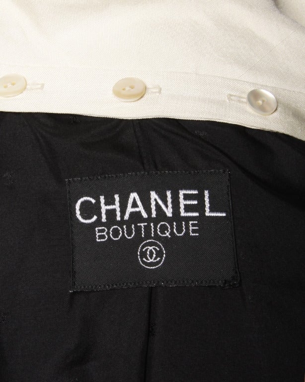 Gorgeous black wool Chanel 2-Piece suit with enamel 