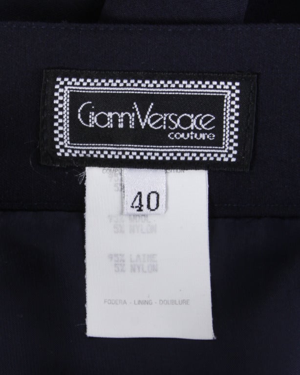 Asymmetric black draped body con skirt by Gianni Versace Couture. Unique and versatile design by one of the most collectible designers ever.

Details

Partially Lined
Back Zip and Hook Closure
Circa: 1990s
Label: Gianni Versace
Marked Size: