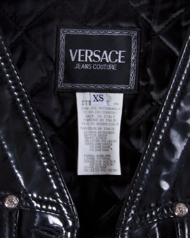 Shiny synthetic patent leather vest with Medusa buttons by Versace Jeans Couture! Quilted interior and front pockets.

Details

Fully Lined
Front Button Closure
Front Pockets
Circa: 1990s
Label: Versace Jeans Couture
Marked Size: