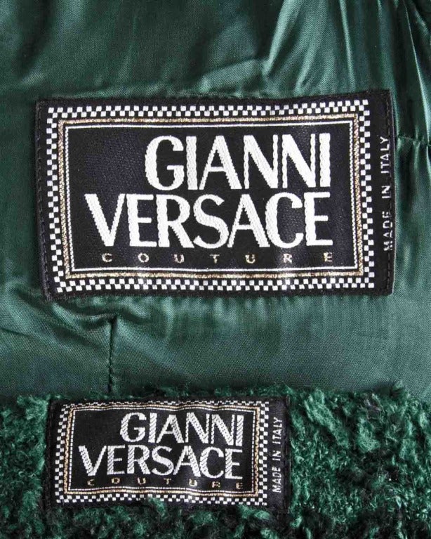 Stunning green plaid boucle wool jacket + skirt suit by Gianni Versace Couture. Pristine tailoring and flattering shape.

Details

Jacket + skirt are both fully lined
Jacket has front button closure
Skirt has back zip, hook, and button