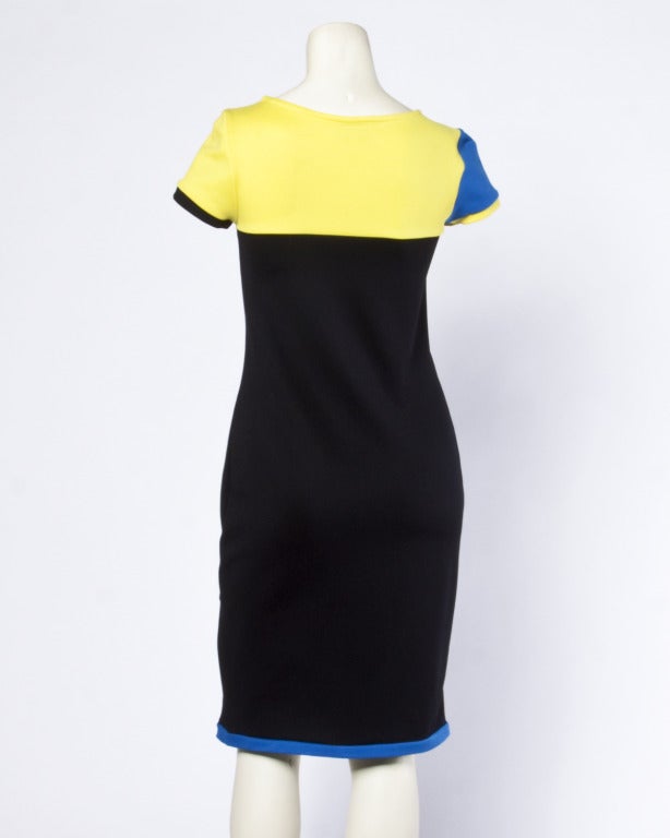 Sexy color block body con dress by Gianni Versace (Versus label). Short sleeves and stretchy scuba fabric.

Details

Unlined
Fabric Contains Some Stretch
Circa: 1990s
Label: Versus Gianni Versace
Marked Size: 42
Estimated Size: S
Color: