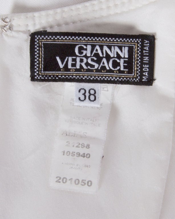 Gianni Versace Couture label mini dress in white stretch fabric. Sexy bustier bust and body hugging cut.

Details

Fully lined
Back zip and hook closure
Circa: 1990s
Label: Gianni Versace
Marked Size: 38
Estimated Size: M
Colors: