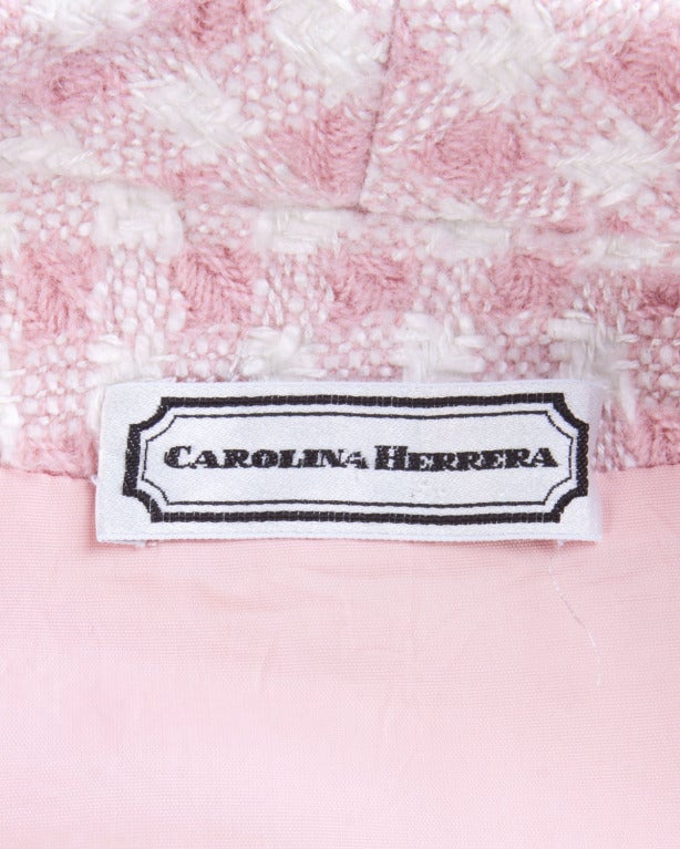 Pink houndstooth wool blazer jacket by Carolina Herrera. Matching pink buttons and cropped length.

Details

Fully lined
Front button closure
Circa: 1990s
Label: Carolina Herrera
Marked Size: 6
Estimated Size: M
Colors: Ivory /