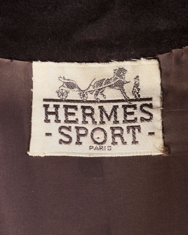 Absolutely stunning vintage coat dress by Hermes Sport in what feels like a chocolate brown cashmere (fabric content is unmarked). Couture hand stitched creamy brown silk lining. Flawless construction and matching 