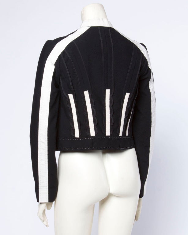 Fantastic black and white deconstructed wool jacket by Chloe. Front hook closure and geometric patchwork design.

Details

Fully lined
Front hook and snap button closure
Circa: 2000's
Label: Chloe
Marked Size: 36
Estimated Size: S
Colors: