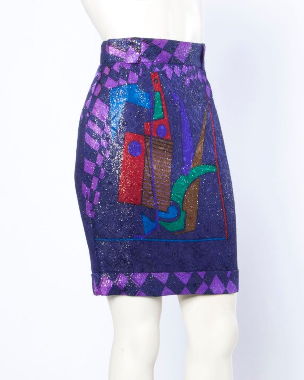Unbelievable Versus by Gianni Versace Picasso-inspired metallic scarf print skirt with a colorful abstract design. From Autumn/ Winter 1990!

Total Length: 20 in, Waist: 24 in, Hip: 34 in
Marked Size: 24/38
Fabric: Acetate/Poly