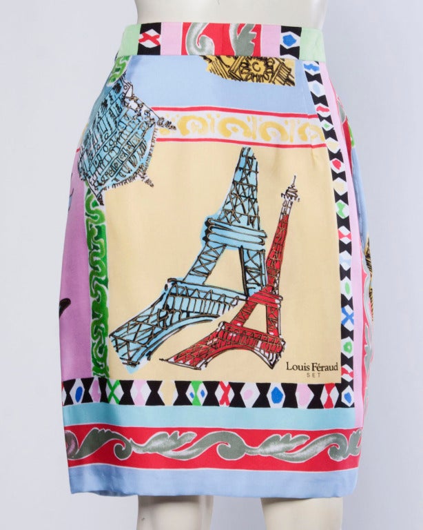 Incredible resort scarf print silk jacket and skirt set by Louis Feraud. Colorful border print includes tourist destinations such as the Eiffel Tower. Both pieces are constructed entirely of medium weight silk and the jacket features signed buttons.